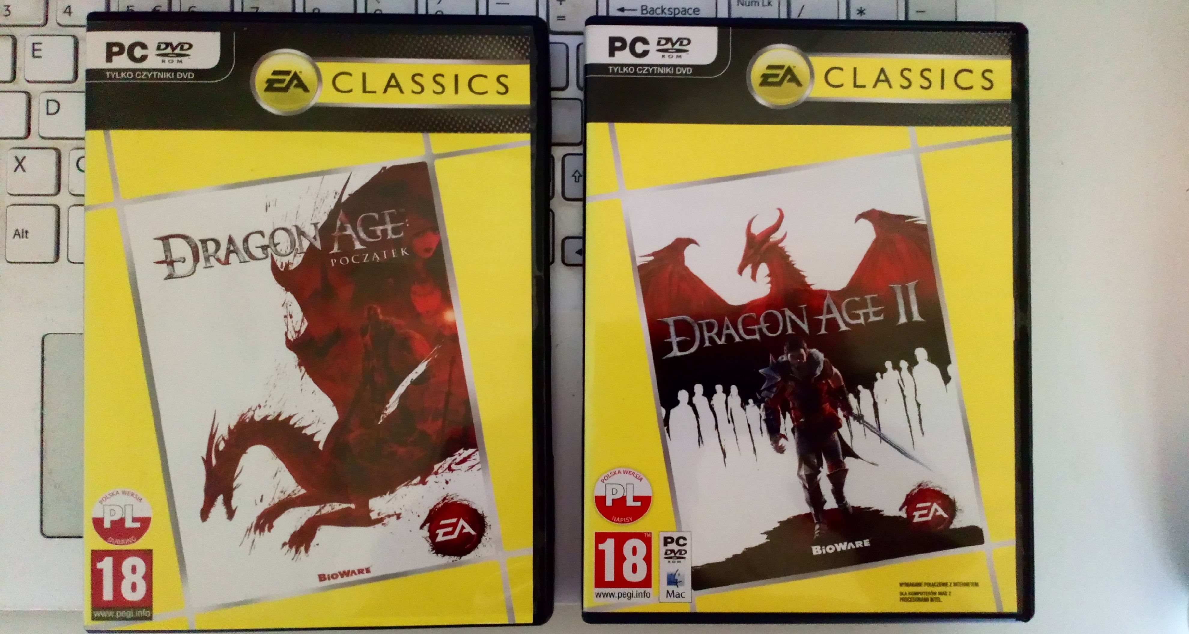Dragon Age Początek 27zł, allegro lokalne<br />Dragon Age II 6.99zł, promo z 20zł, allegro lokalne